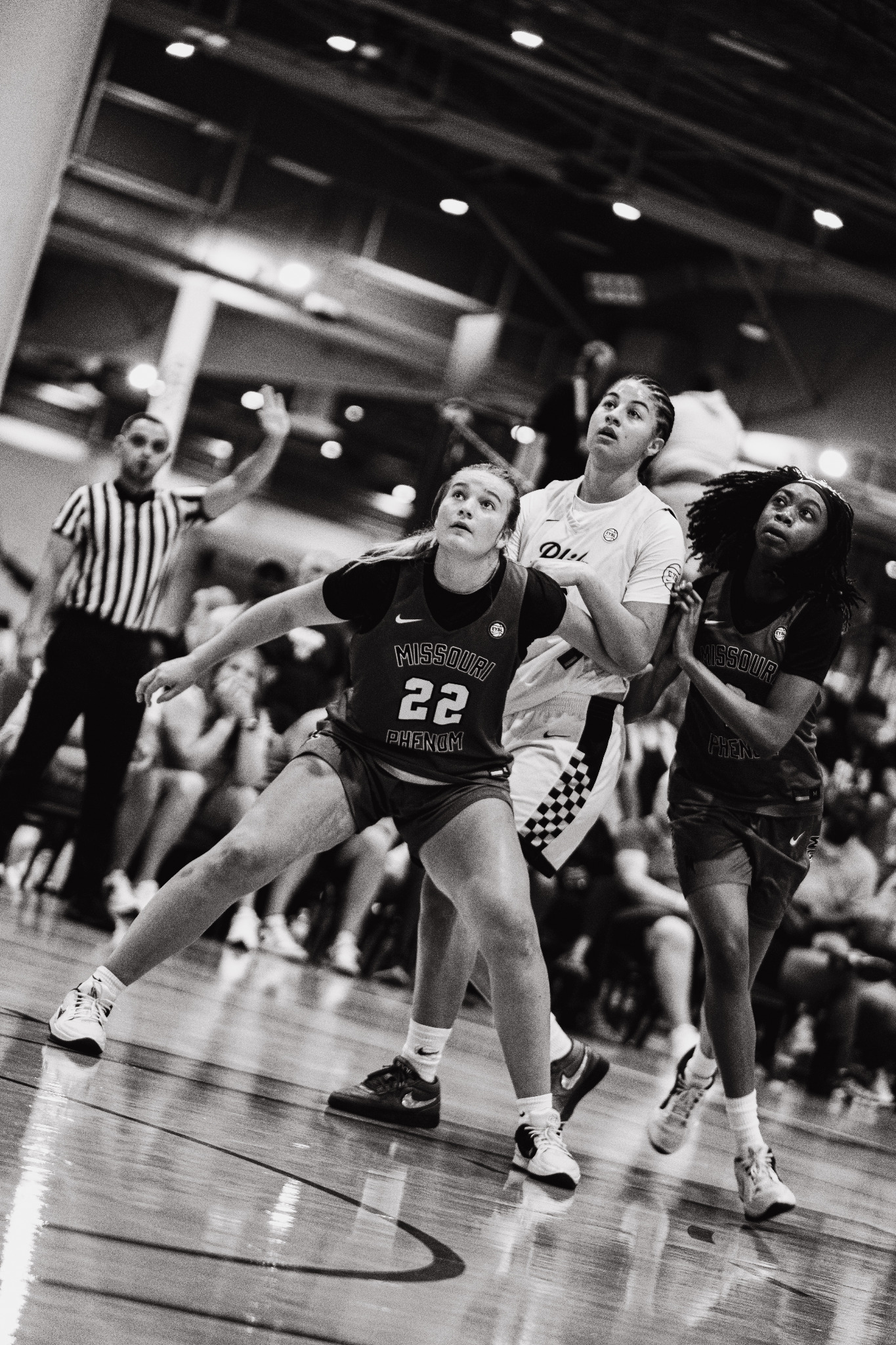 Female basketball players competing during a tournament